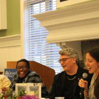 The alumni panel speaks to the audience